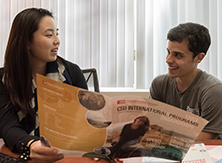 Advisor assisting student
