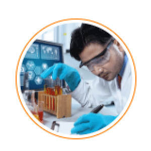 male scientist checking test tubes while writing down observations